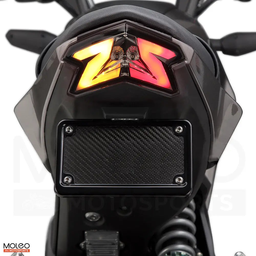 LEDs ignite in a fury of red and amber, ensuring the Z125 PRO seen on every corner