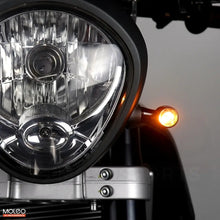 MOLEO Motosports Bullet Style Front LED Indicators are installed on the cafe racer vintage motorcycle.