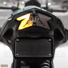 The tail light's aggressive design mirrors the bike's bulging tank, ensuring it's never overlooked on the road