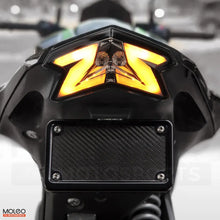 The tail light dual-function LEDs flicker with intensity, ensuring the Z800 commands attention whether cruising city streets