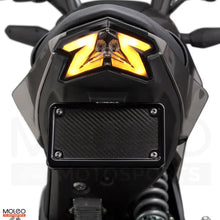 Turn signals featuring a dual 'Z' design seamlessly integrate the iconic Kawasaki Z-series elements into the integrated tail light